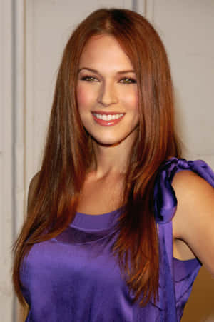 Amanda Righetti Smilingin Purple Dress Wallpaper