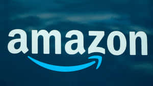 Amazon Uk's Iconic Logo Featuring A Blue Arrow Wallpaper