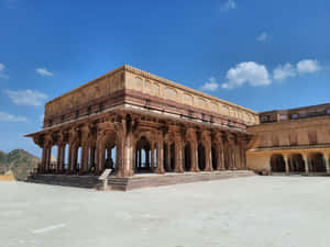 Amer Fort Standing Proud Against A Blue Sky Wallpaper