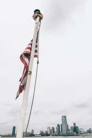 American Flag Pole City Skyline Backdrop Wallpaper