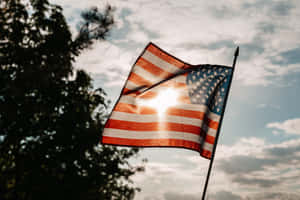 American Flag Sunlit Sky Wallpaper