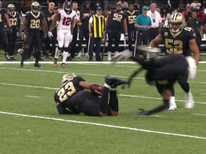 American Football Player Marshon Lattimore Down Wallpaper