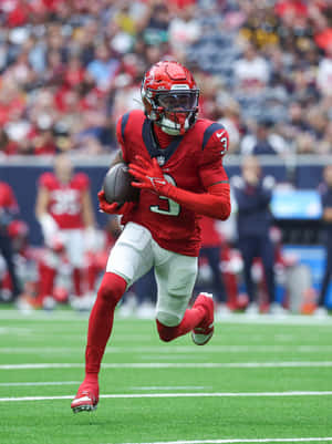 American Football Player Running With Ball Wallpaper