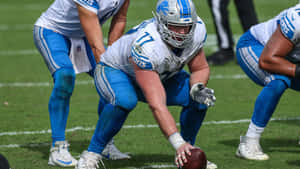 American Footballer Frank Ragnow Ready Position Wallpaper