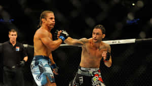 American Mixed Martial Artist Frankie Edgar Versus Urijah Faber Wallpaper