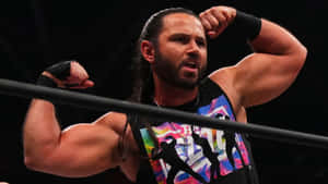 American Professional Wrestler Matt Jackson Showcasing His Signature Flexing Pose. Wallpaper