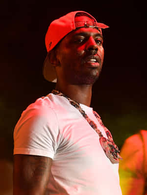 American Rapper Young Dolph Enjoying Success Wallpaper