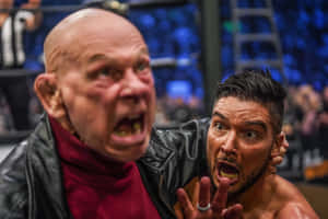 American Retired Wrestler Baron Von Raschke And Wrestler Ethan Page Wallpaper