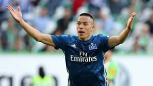 American Soccer Star Bobby Wood In Action Wallpaper