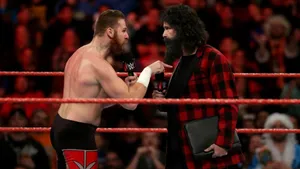American Veteran Wrestler Mick Foley And Sami Zayn Wallpaper