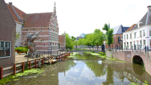 Amersfoort Canal Viewwith Sculpture Wallpaper