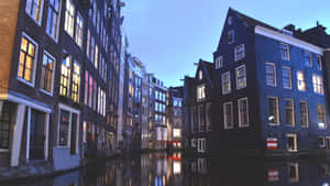 Amsterdam Canal Housesat Twilight Wallpaper