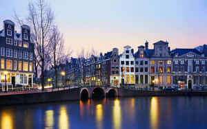 Amsterdam Canal Housesat Twilight Wallpaper