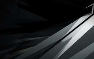 An Abstract Design Of A Black Gradient Background Wallpaper