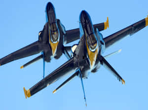 An Aerial Demonstration Of The U.s. Navy Flight Demonstration Squadron, The Blue Angels. Wallpaper