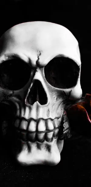 An Aerial View Of A Village Surrounded By Lush Green Mountains Wallpaper