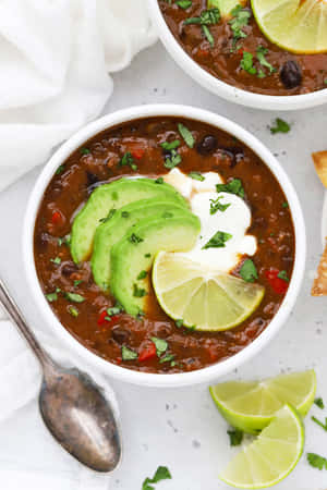 An Appetizing Bowl Of Black Bean Soup. Wallpaper