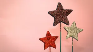 An Array Of Towers Silhouetted Against A Vibrant Sunset. Wallpaper