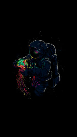 An Astronaut Is Holding A Colorful Ball Wallpaper