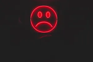 An Electrifying Neon Pattern Of Red And Black Wallpaper