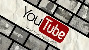 An Engaging View Of A Video Hosting Interface Displayed On A Futuristic Transparent Screen, Including A Video Player, Thumbnail Grid, And Search Panel. Wallpaper