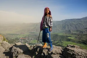 An Ethiopian Boy Above The Hills In Lalibela, Ethiopia Wallpaper