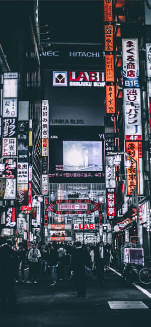 An Evening Stroll Through The Streets Of Dark Japan Wallpaper