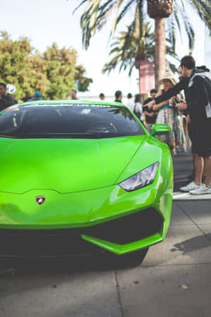 An Exquisite Green Lamborghini Crafted For Iphone Wallpaper