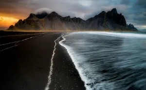 An Idyllic Black Sand Beach, Paradise On Earth. Wallpaper