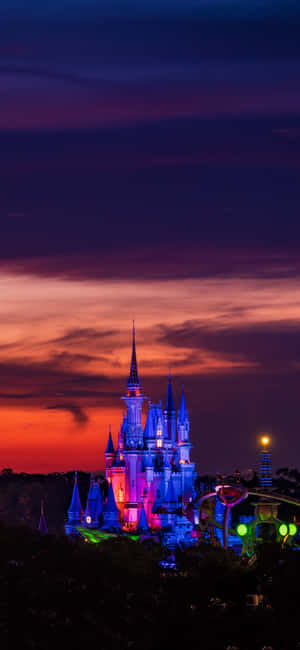 An Illustrated Shot Of Disney World On A Modern Iphone Wallpaper