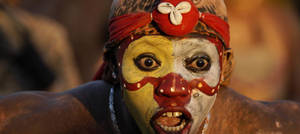 An Indigenous Person In The Lush Landscapes Of French Guiana Wallpaper