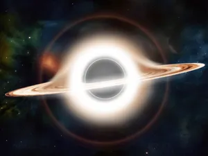 An Interstellar Black Hole Swirls In An Infinite Universe Of Stars Wallpaper