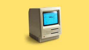 An Old Computer Retrospectively Placed In A Modern Setting Wallpaper