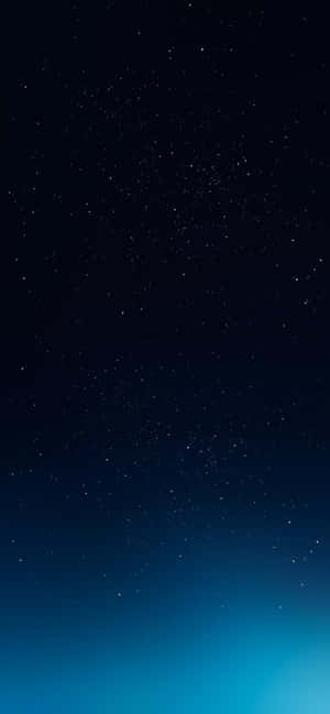 An Up-close View Of An Iphone With A Blue Galaxy Design Wallpaper