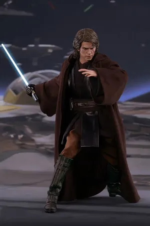 Anakin Skywalker Action Figure With Lightsaber Wallpaper
