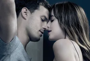 Anatasia Kissing Christian In Fifty Shades Of Grey Wallpaper