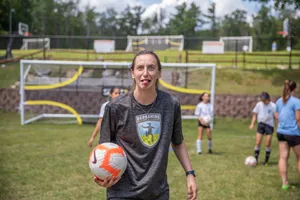 Andi Sullivan: Dominating The Football Field Wallpaper