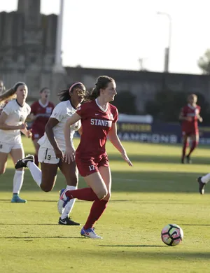 Andi Sullivan Exhibiting Mastery In Football Wallpaper