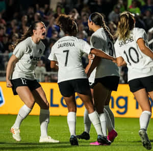 Andi Sullivan In Action - The Game-changing Football Star Wallpaper