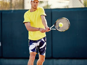 Andreas Seppi In Yellow Shirt Wallpaper