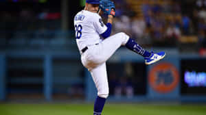 Andrew Heaney In Action On The Pitcher's Mound Wallpaper