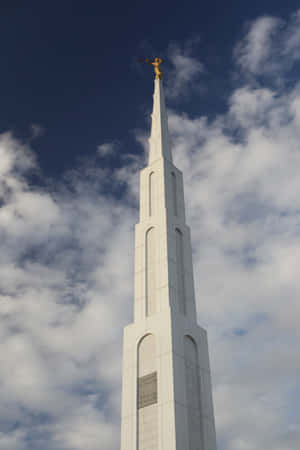 Angel Moroni Statue Atop The Mormon Temple Spire Wallpaper