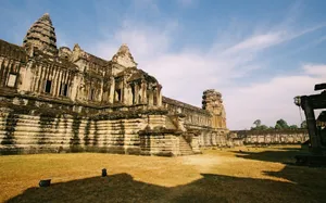Angkor Wat Ruins In Cambodia Beneath Blue Sky Wallpaper