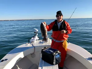 Angler's Paradise - A Fishing Rod Against Sunset Sky Wallpaper