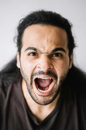 Angry Man Yelling Portrait Wallpaper