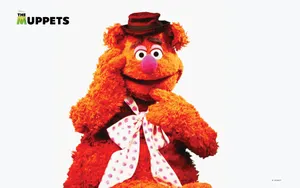 Animal Muppet Bringing Fun And Imagination Anywhere Wallpaper