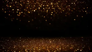 Animated Bokeh Black And Gold Glitter Wallpaper