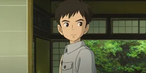 Animated Boy In Traditional Room Wallpaper