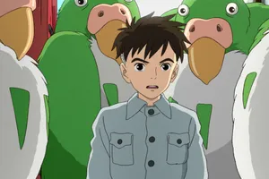 Animated Boy With Creatures Wallpaper