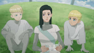 Animated Trio Sittingin Grass Wallpaper